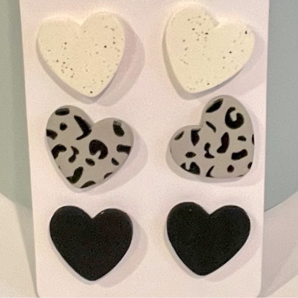 Leopard print NEW 3 pair Heart Shaped earrings. Check pics.